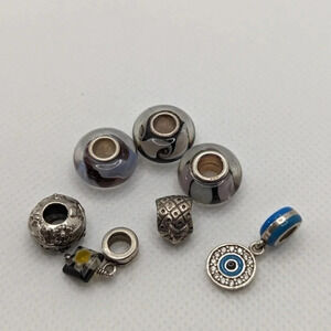 7 sterling  charms